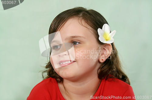 Image of Child Smiling Looking Away