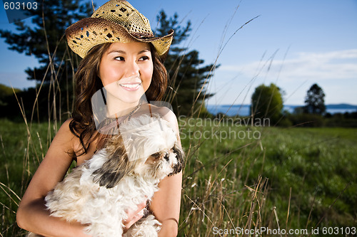 Image of Summer girl with her dog
