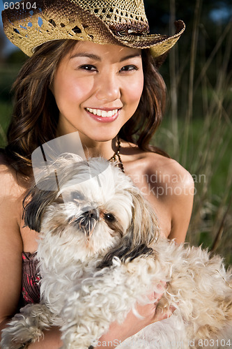 Image of Beautiful summer girl with her dog