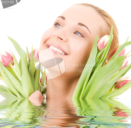 Image of happy woman with flowers