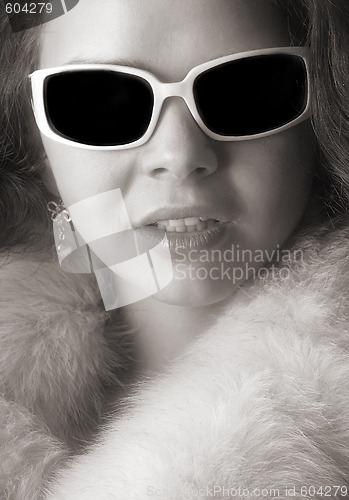 Image of woman in sunglasses