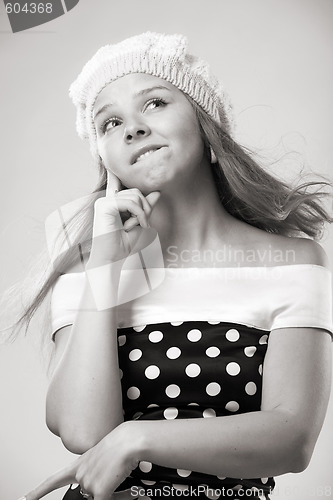 Image of beautiful thoughtful girl in beret