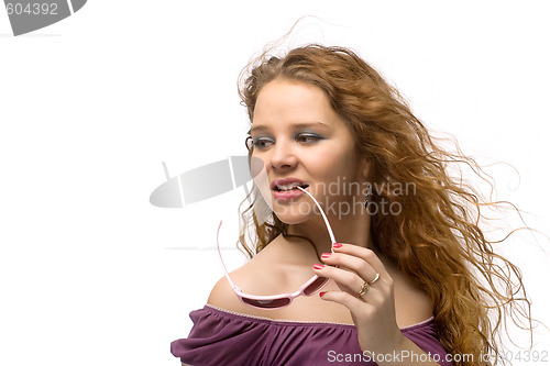 Image of smiling woman with sunglasses