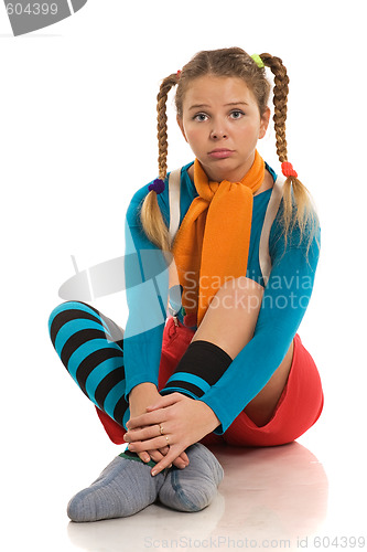 Image of sad girl in colour clothes