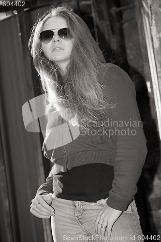 Image of young beautiful  girl in sun glasses