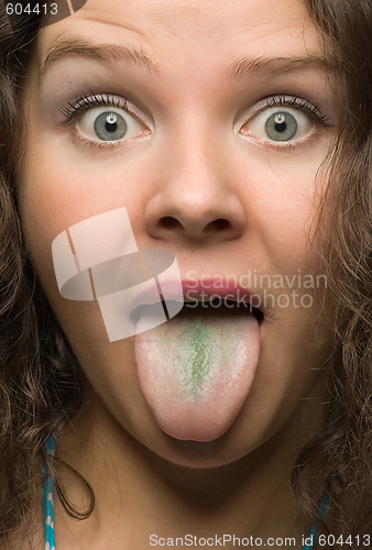 Image of funny woman with green tongue