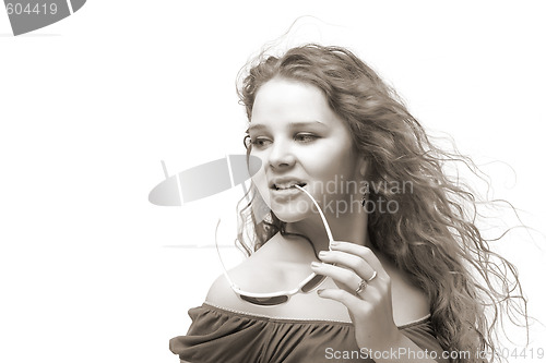 Image of smiling woman with sunglasses