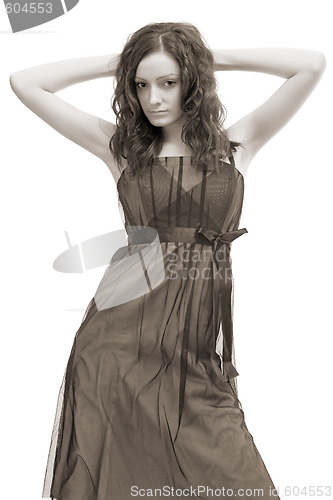 Image of beautiful girl in brown dress