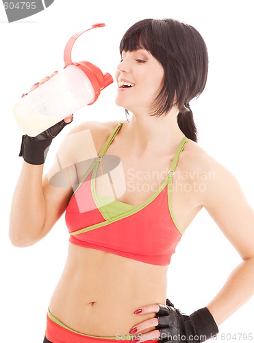 Image of fitness instructor with protein shake