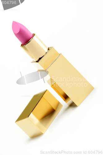 Image of Pink golden lipstick on white background