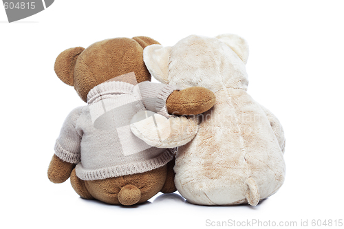 Image of Back view of two Teddy bears hugging each other