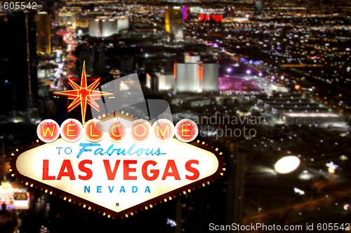 Image of Las Vegas Welcome Sign With Night Time Strip in the Background