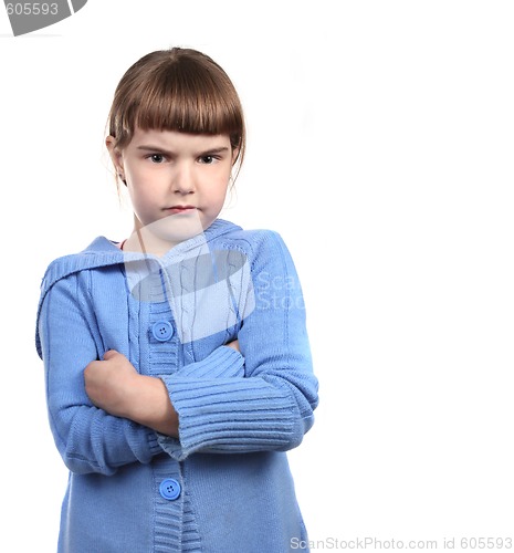Image of Defiant Young Child With Arms Crossed