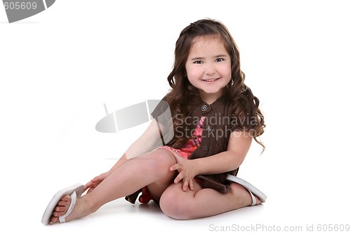 Image of Charming Brown Eyed Toddler Girl on White Background