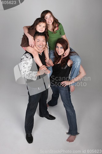 Image of Fun and Unusual Vertical Family Portrait