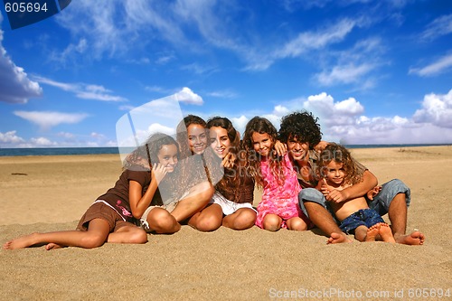 Image of 6 Happy Brothers and Sisters Smiling Outdoors at the Beach