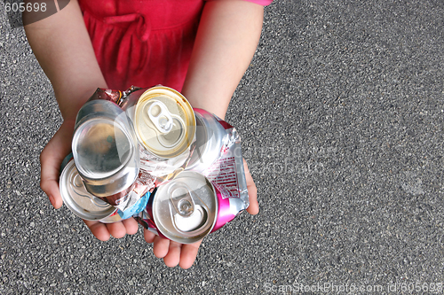 Image of Child Recycling Aluminum Cans