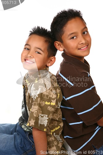 Image of Hispanic American Brothers Sitting and Smiling