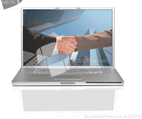 Image of Two Business Men Shaking Hands