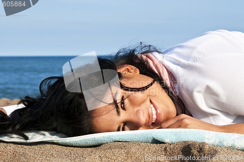 Image of Young native american woman at beach