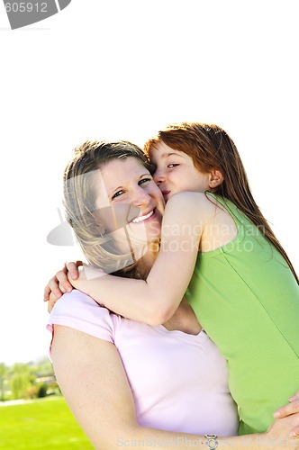 Image of Mother and daughter hugging