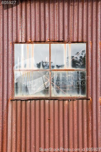 Image of old rusty metal tin shed