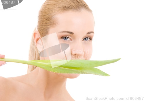 Image of woman with green leaf