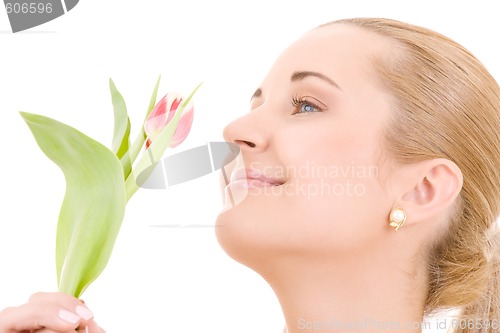 Image of happy woman with flower