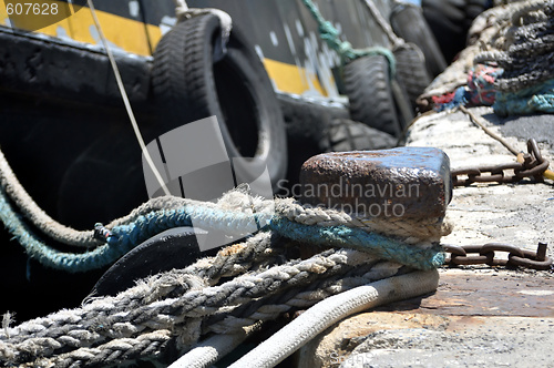 Image of Transportation: ship tied to old rusty mooring cleat