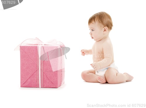Image of baby boy with big gift box