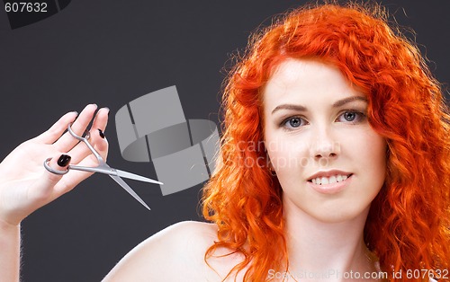 Image of redhead with scissors