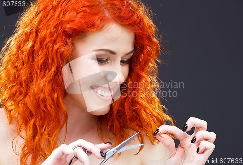 Image of redhead with scissors