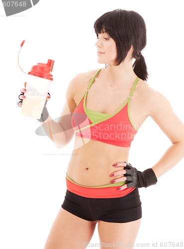 Image of fitness instructor with protein shake