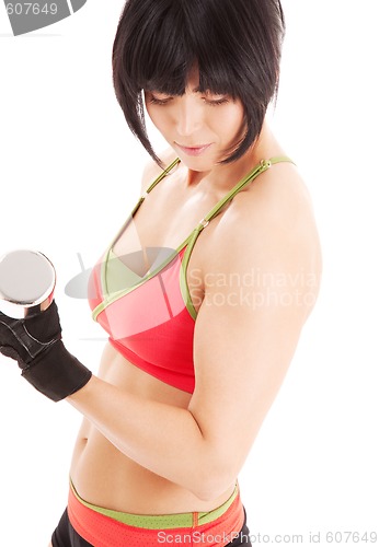 Image of muscular fitness instructor with dumbbells
