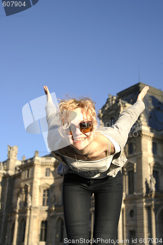 Image of young pretty caucasian lady having fun