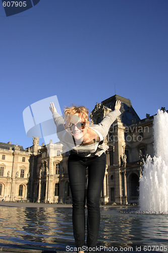 Image of young pretty caucasian lady having fun