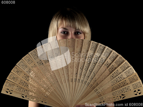 Image of Beautiful blonde with fan