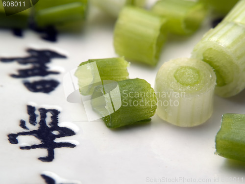 Image of Cut green onion on plate