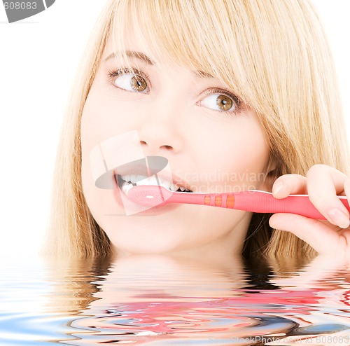 Image of happy girl with toothbrush