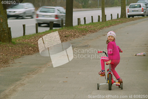 Image of The girl on a bicycle
