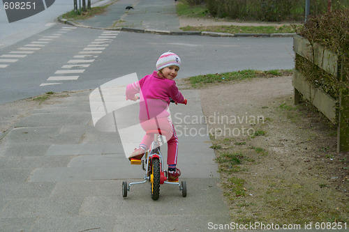 Image of The girl on a bicycle