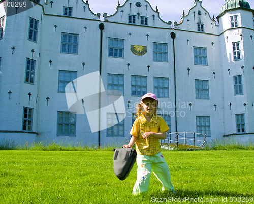 Image of The girl before a palace