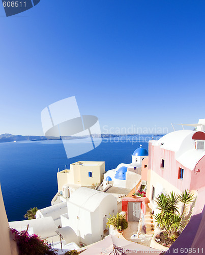 Image of santorini greek island scene with blue dome churches