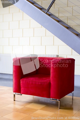 Image of Red armchair and stairs