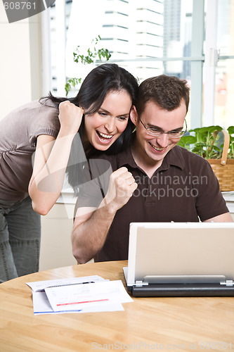 Image of Happy couple online banking