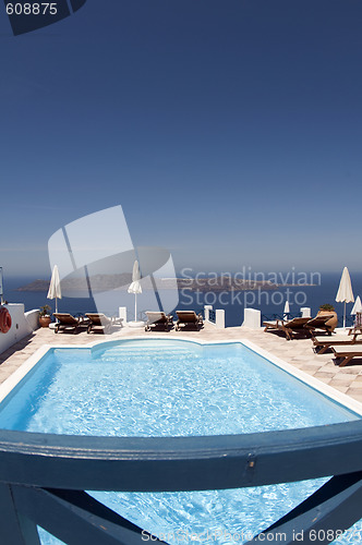 Image of swimming pool over sea santorini