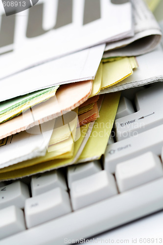 Image of computer and magazines