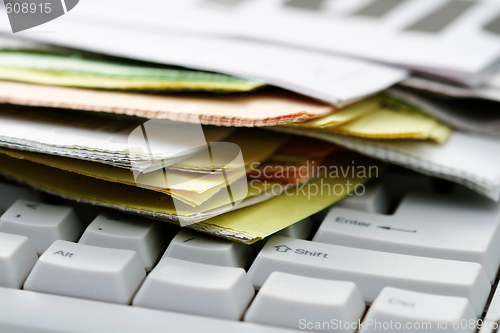 Image of computer and magazines