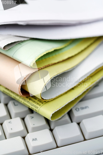 Image of computer and magazines