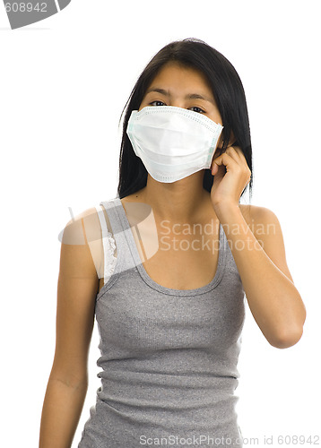 Image of protective face mask on asian woman